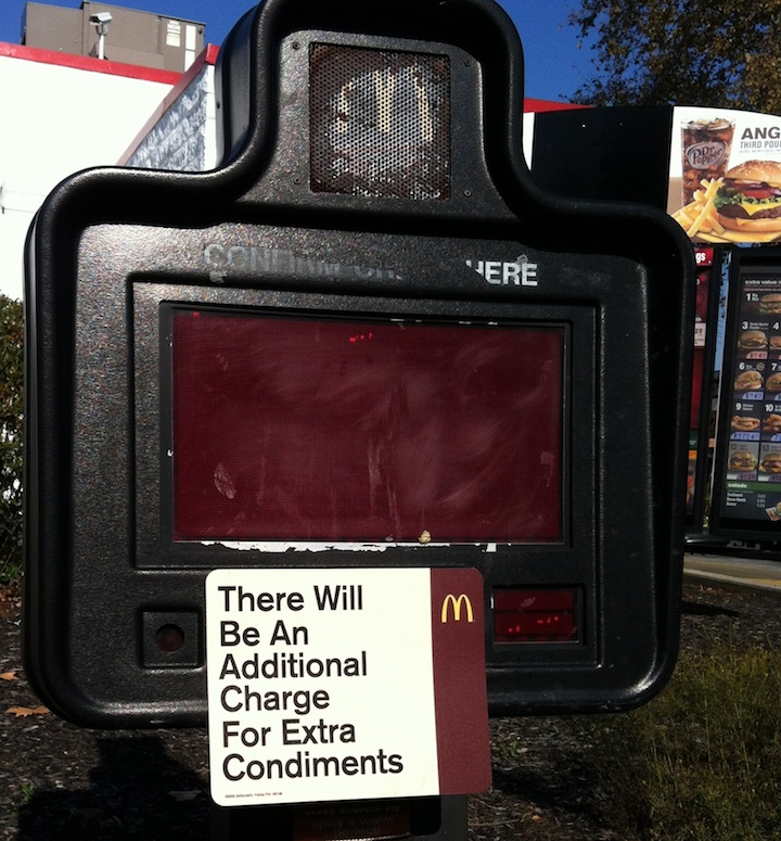 disgusting mcdonalds filth and extra charge for condiments sign